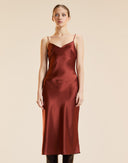 Silk slip dress in rust