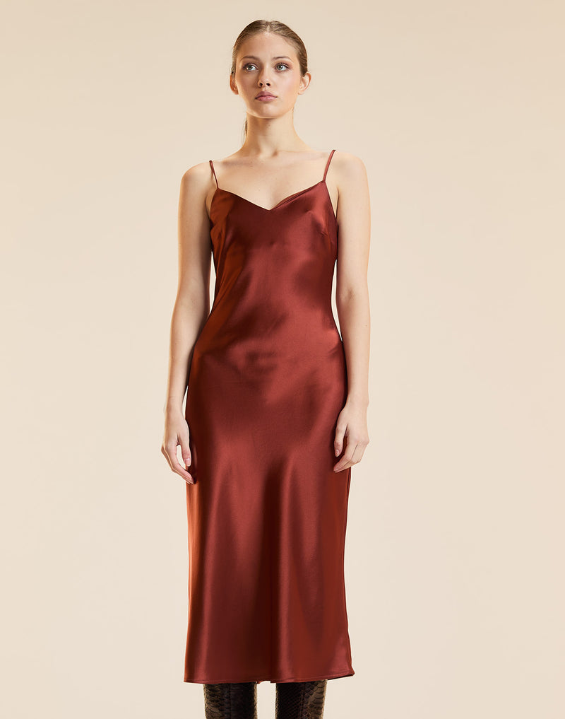 Silk slip dress in rust