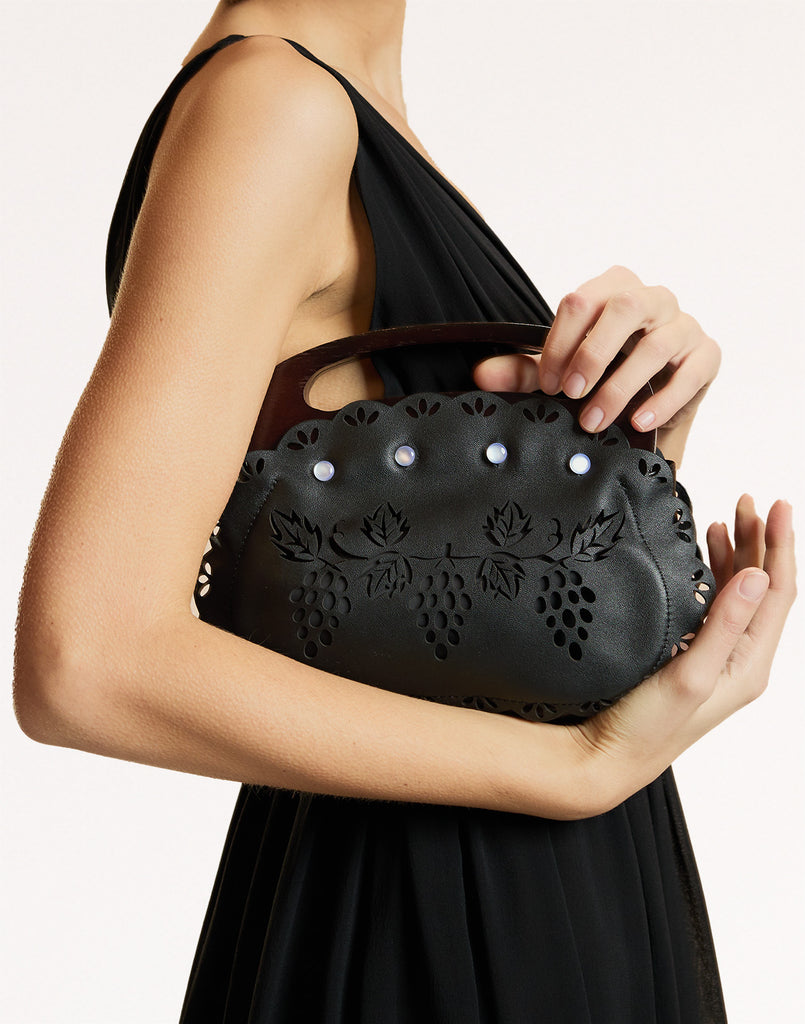 Black laser cut purse